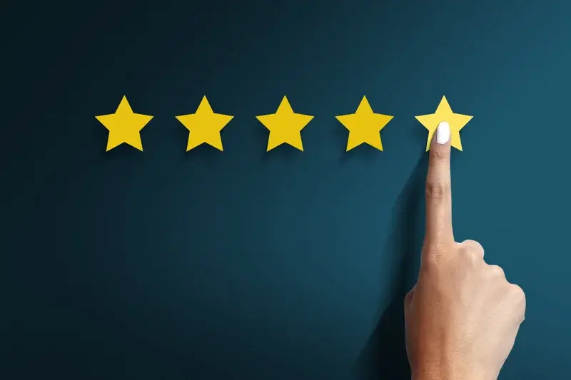 five yellow stars on blue wall